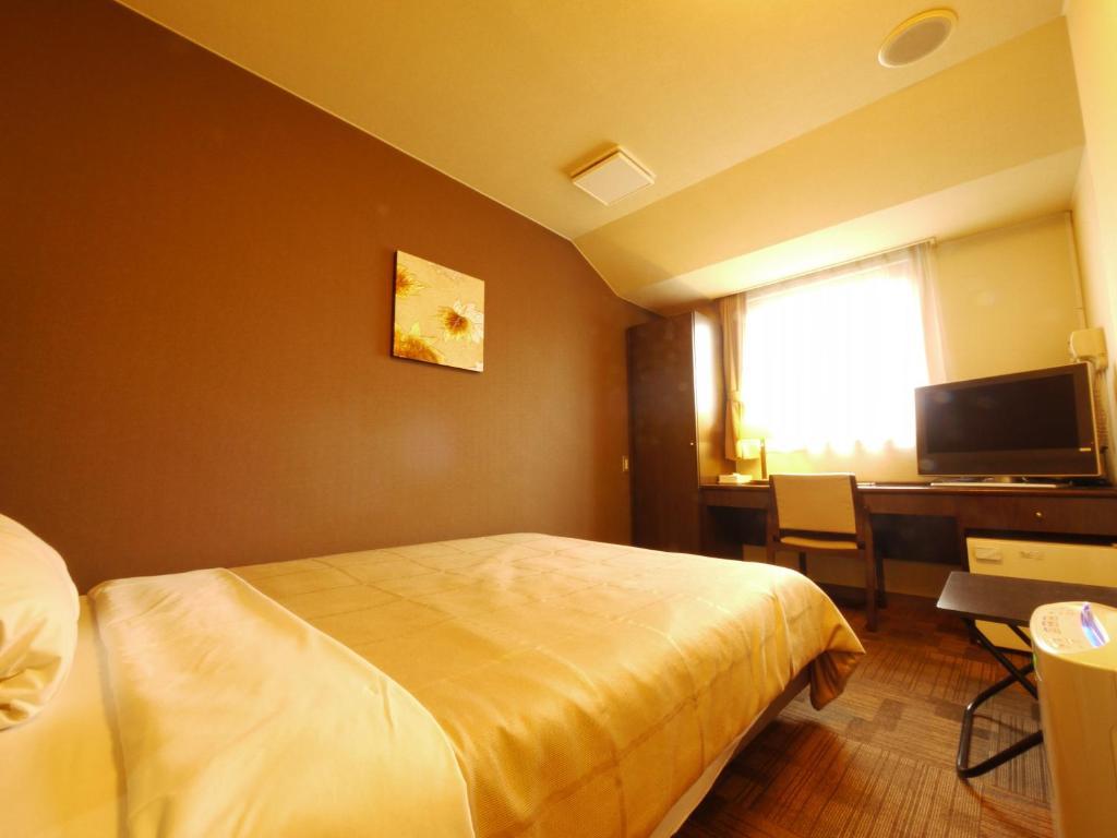 Hotel Route-Inn Ageo Rum bild